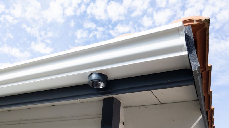 Gutter Installation on a Residential Roof
